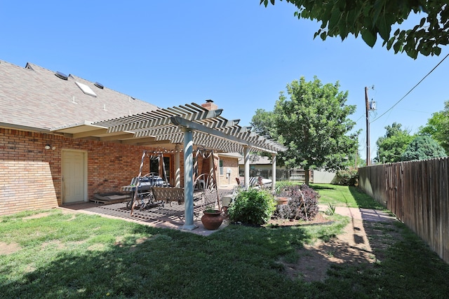 1206 Olive St, Stratford, TX 79084 - fenced backyard featuring a pergola and a patio area