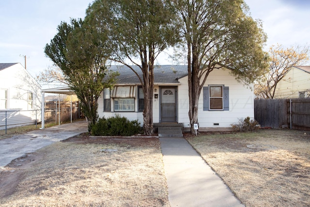 view of front of house with a carport