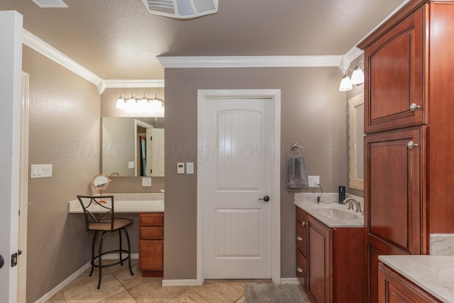 2101 Bowie St, Amarillo, TX 79109 - full bathroom with crown molding, two vanities, tile patterned flooring, and a textured ceiling