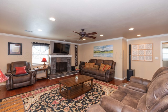 2101 Bowie St, Amarillo, TX 79109 - living area with ceiling fan, healthy amount of natural light, wood finished floors, recessed lighting, and ornamental molding
