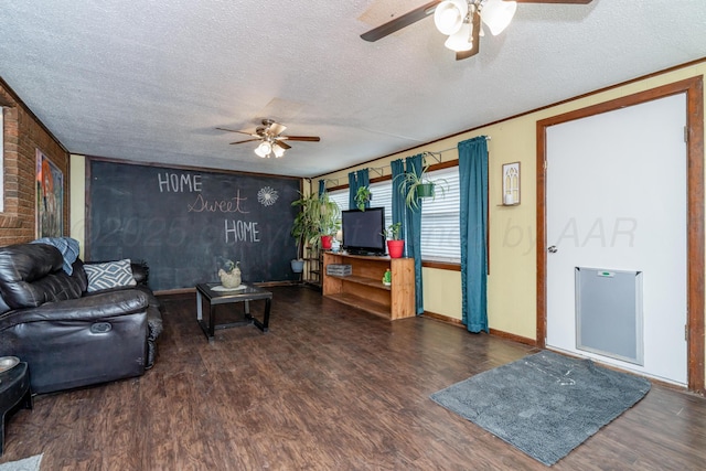 107 Elm St, Hereford, TX 79045 - living room with baseboards, a ceiling fan, wood finished floors, and a textured ceiling