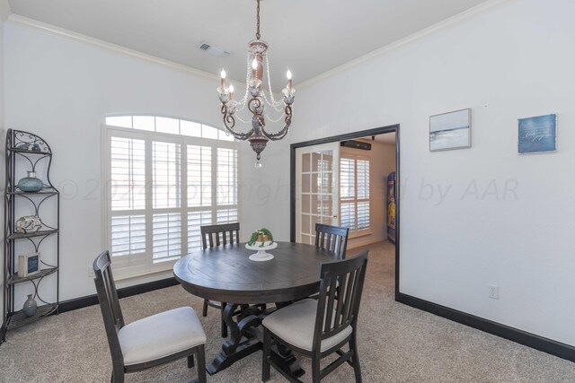 2408 Drake Elm Pl, Amarillo, TX 79124 - dining room with carpet, a chandelier, healthy amount of natural light, and crown molding