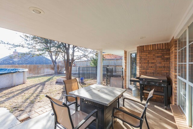 2408 Drake Elm Pl, Amarillo, TX 79124 - fenced backyard with outdoor dining space, a patio area, and area for grilling