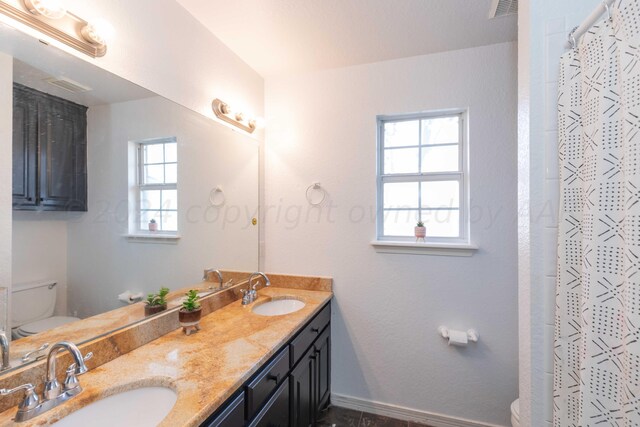 2408 Drake Elm Pl, Amarillo, TX 79124 - bathroom with double vanity and curtained shower