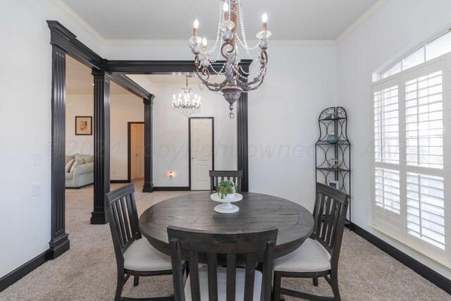 2408 Drake Elm Pl, Amarillo, TX 79124 - dining room featuring a chandelier, light carpet, and crown molding