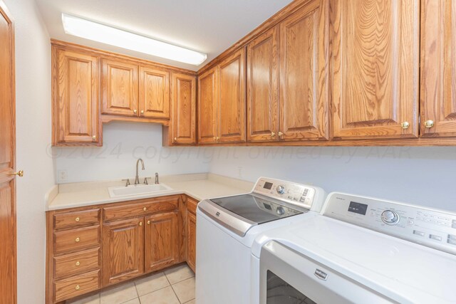 2408 Drake Elm Pl, Amarillo, TX 79124 - washroom featuring cabinet space, independent washer and dryer, and light tile patterned floors