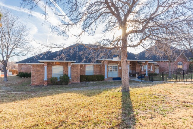 2408 Drake Elm Pl, Amarillo, TX 79124 - back of house featuring brick siding and roof with shingles