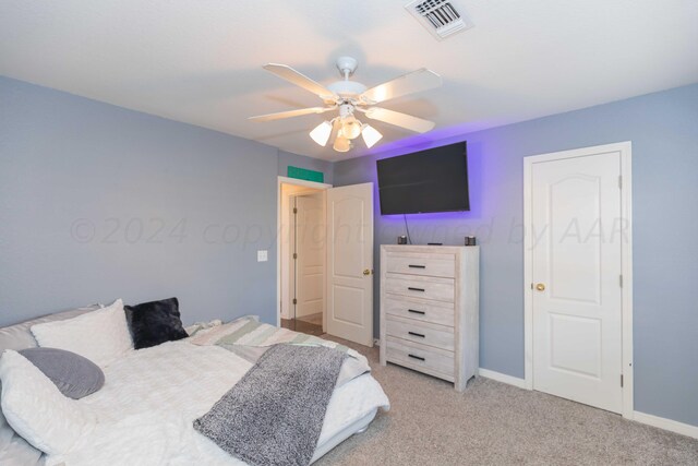 2408 Drake Elm Pl, Amarillo, TX 79124 - bedroom with light colored carpet and a ceiling fan