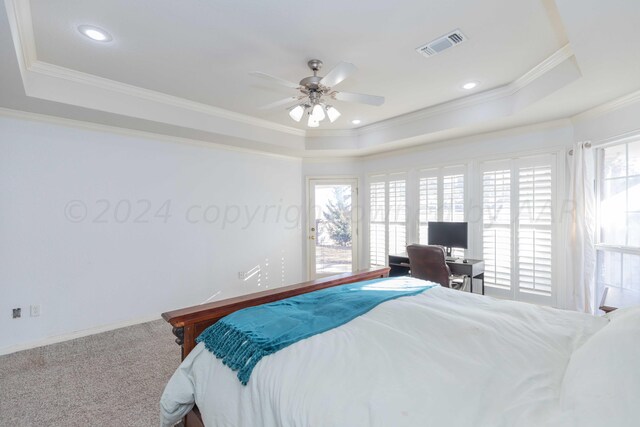 2408 Drake Elm Pl, Amarillo, TX 79124 - bedroom with a raised ceiling, crown molding, carpet flooring, ceiling fan, and a desk