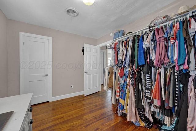 312 SW 45th Ave, Amarillo, TX 79110 - walk in closet with wood finished floors