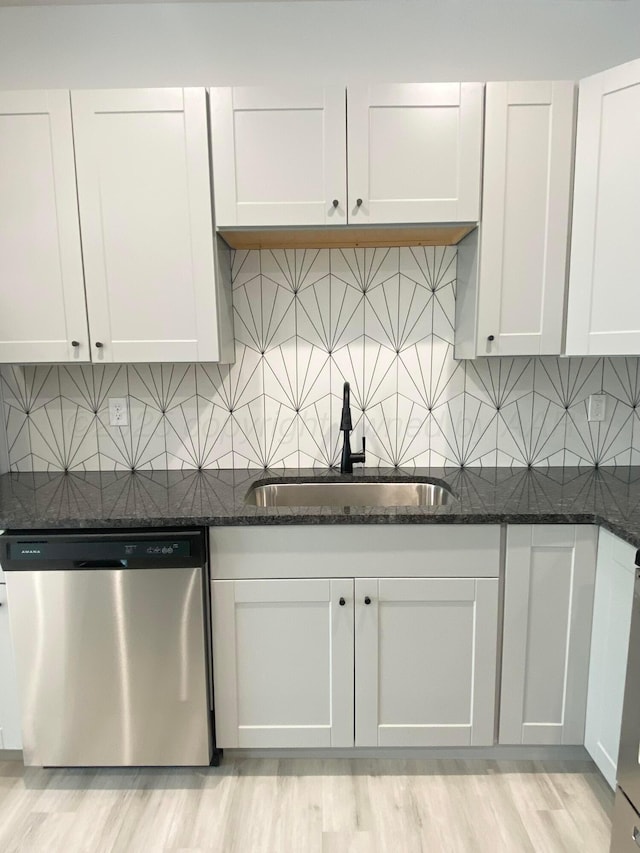 2 S Hunsley Hills Blvd, Canyon, TX 79015 - kitchen featuring stainless steel dishwasher, a sink, white cabinets, and dark stone counters