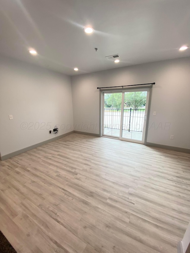 2 S Hunsley Hills Blvd, Canyon, TX 79015 - empty room with recessed lighting, baseboards, light wood finished floors, and fire sprinkler in ceiling