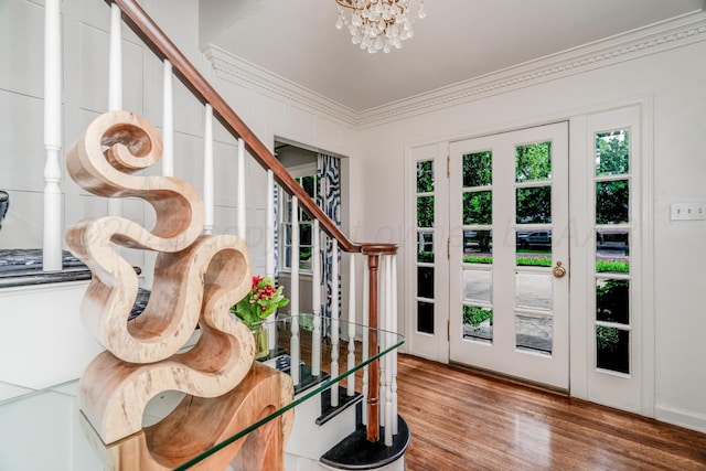 3208 S Ong St, Amarillo, TX 79109 - entrance foyer with ornamental molding, stairs, a chandelier, plenty of natural light, and wood finished floors