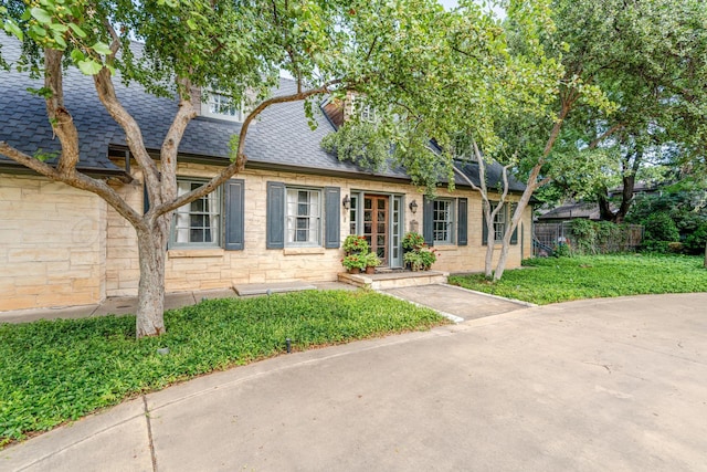3208 S Ong St, Amarillo, TX 79109 - view of front of house with roof with shingles and stone siding