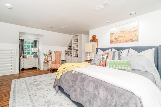 3208 S Ong St, Amarillo, TX 79109 - bedroom featuring wood finished floors and vaulted ceiling