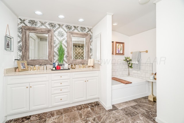 3208 S Ong St, Amarillo, TX 79109 - full bath featuring double vanity, a garden tub, and recessed lighting