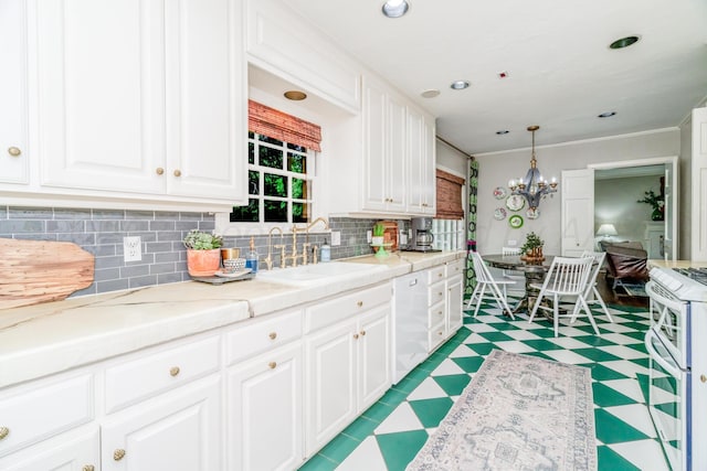3208 S Ong St, Amarillo, TX 79109 - kitchen with light floors, white range, dishwasher, a chandelier, and white cabinets