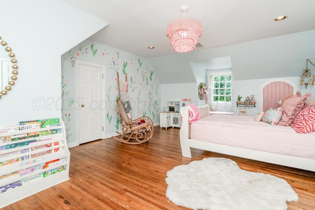 3208 S Ong St, Amarillo, TX 79109 - bedroom with vaulted ceiling, wood finished floors, a chandelier, and recessed lighting