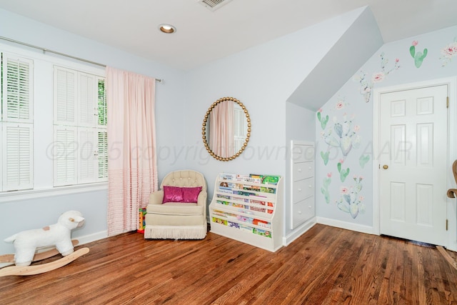 3208 S Ong St, Amarillo, TX 79109 - sitting room with wood finished floors, lofted ceiling, and recessed lighting