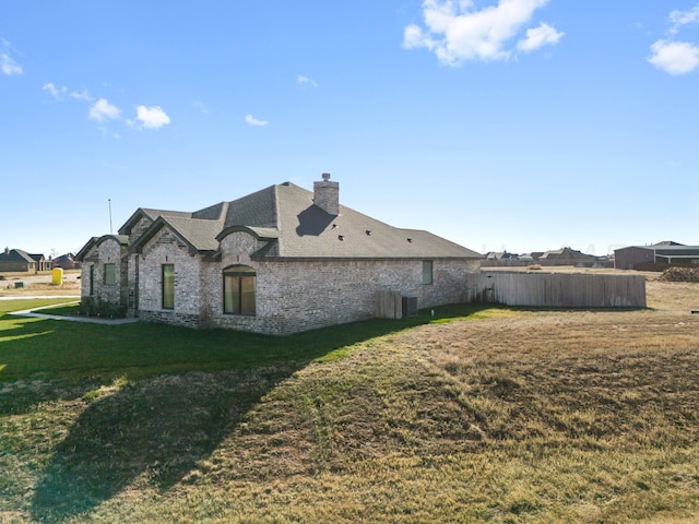 view of property exterior featuring a yard