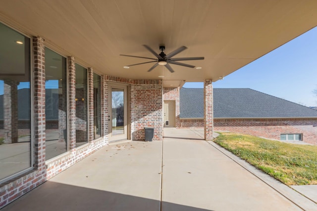 view of patio featuring ceiling fan