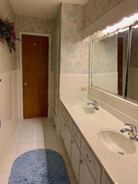 bathroom with vanity and tile patterned flooring