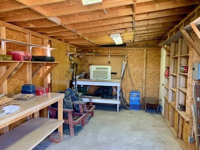 storage room featuring a wall unit AC