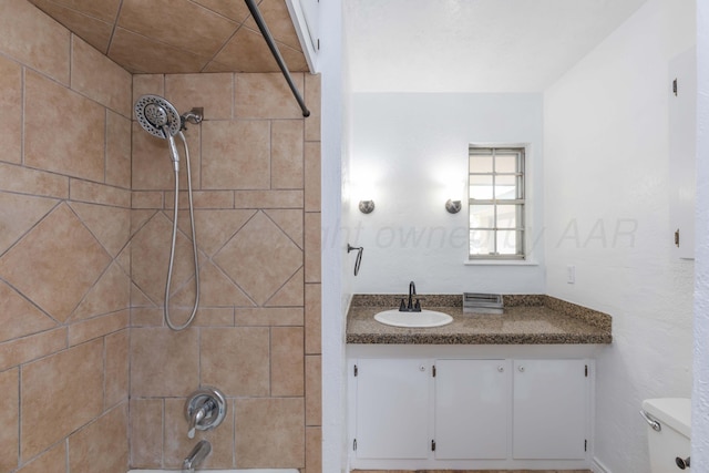 full bath featuring shower / bath combination, vanity, and toilet
