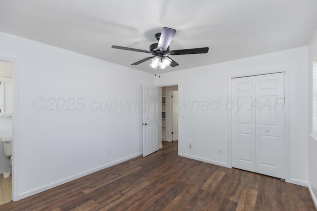 unfurnished bedroom with dark wood-style floors, baseboards, a closet, and a ceiling fan