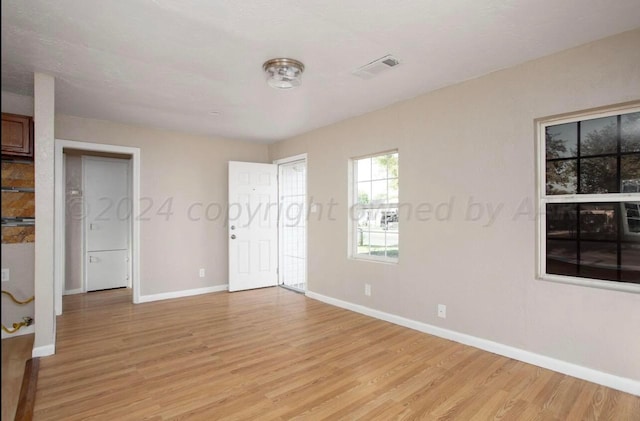 bedroom with light hardwood / wood-style floors