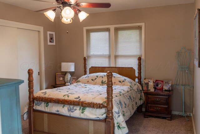 1002 S Main St, Wheeler, TX 79096 - carpeted bedroom with a closet and a ceiling fan