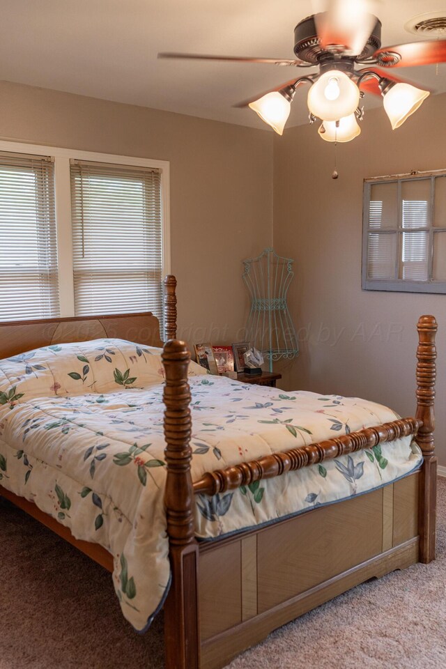 1002 S Main St, Wheeler, TX 79096 - bedroom with carpet and a ceiling fan
