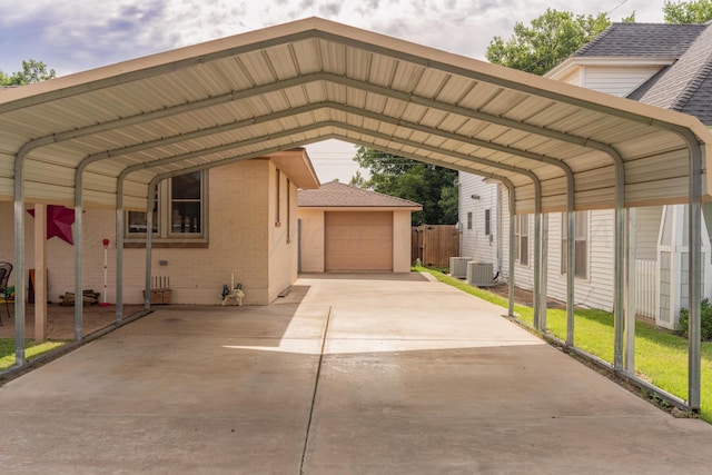 1002 S Main St, Wheeler, TX 79096 - view of vehicle parking with a detached carport and driveway
