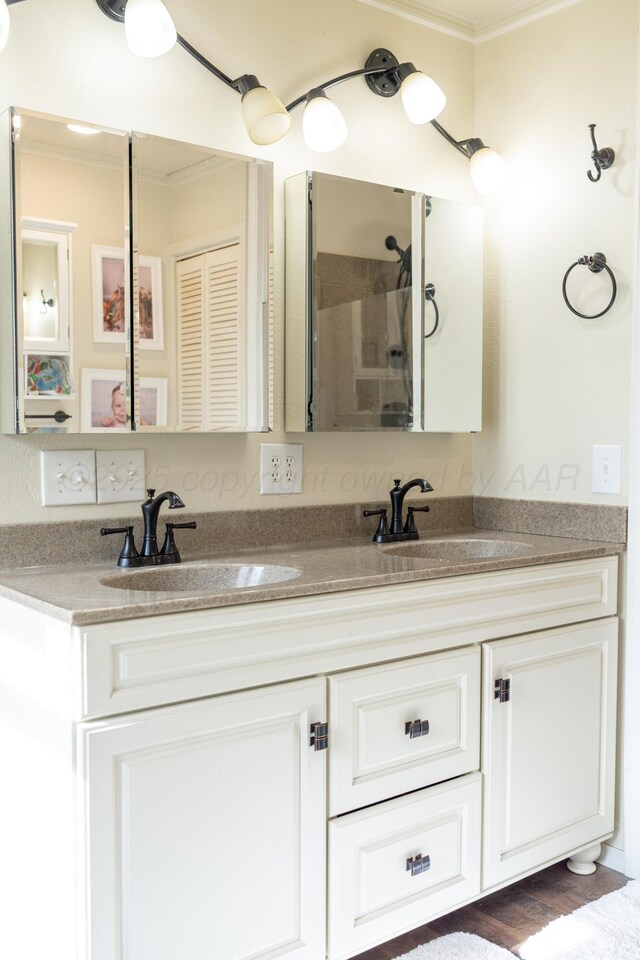 1002 S Main St, Wheeler, TX 79096 - bathroom with crown molding, double vanity, and a shower