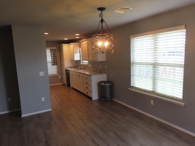 7208 Gemini Trl, Amarillo, TX 79118 - kitchen featuring a sink, white cabinetry, black dishwasher, baseboards, and recessed lighting