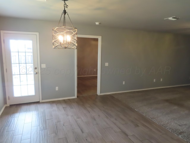 7208 Gemini Trl, Amarillo, TX 79118 - spare room with baseboards, wood finished floors, and healthy amount of natural light