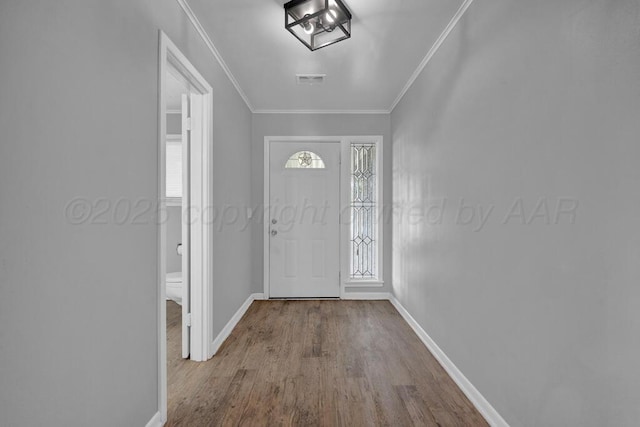 3700 Paramount Blvd, Amarillo, TX 79109 - entrance foyer with crown molding and wood finished floors