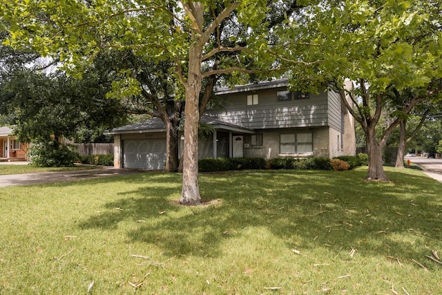 3700 Paramount Blvd, Amarillo, TX 79109 - view of front of property with a garage, brick siding, and concrete driveway