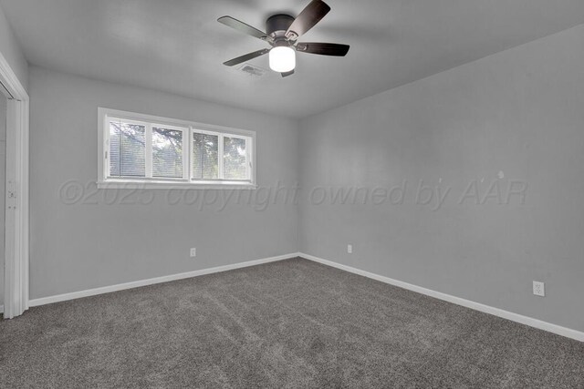 3700 Paramount Blvd, Amarillo, TX 79109 - empty room featuring ceiling fan and dark carpet