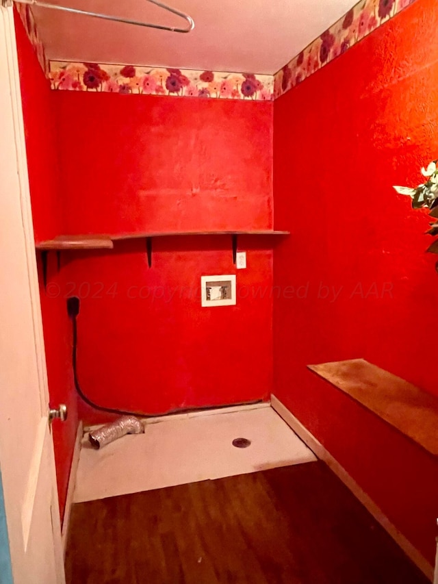 washroom featuring washer hookup and hardwood / wood-style flooring