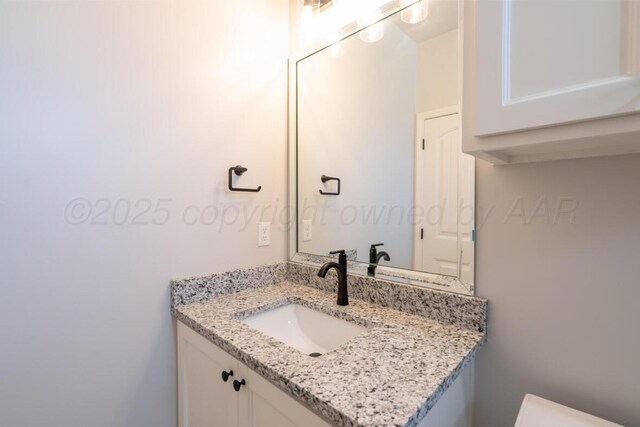 719 Prairie Ave, Dumas, TX 79029 - bathroom featuring vanity