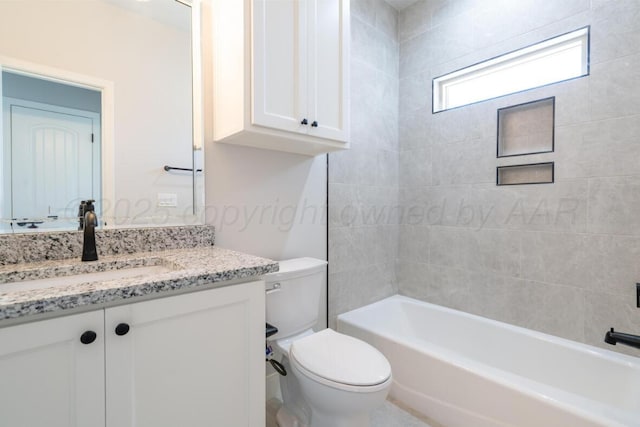 719 Prairie Ave, Dumas, TX 79029 - full bathroom featuring toilet, vanity, and shower / washtub combination