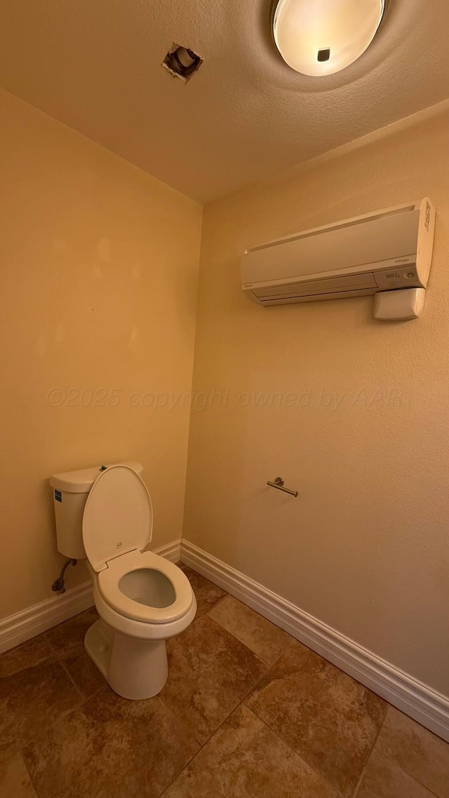 1011 S Lamar St, Amarillo, TX 79102 - bathroom featuring an AC wall unit and tile patterned floors