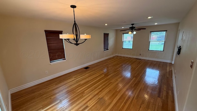 1011 S Lamar St, Amarillo, TX 79102 - spare room with wood finished floors, ceiling fan, and recessed lighting