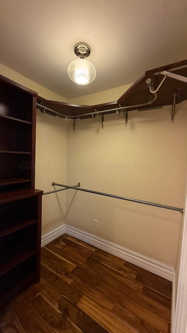 1011 S Lamar St, Amarillo, TX 79102 - spacious closet with dark wood-style floors