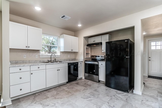 kitchen with white cabinetry, a healthy amount of sunlight, black appliances, and sink