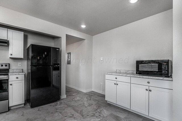 kitchen with white cabinetry, black appliances, and ventilation hood