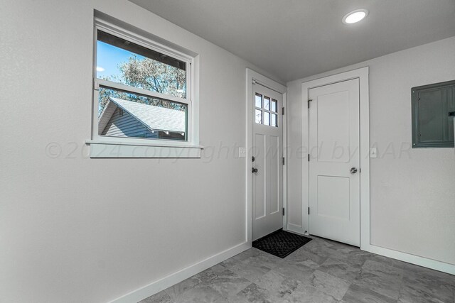 foyer entrance featuring electric panel