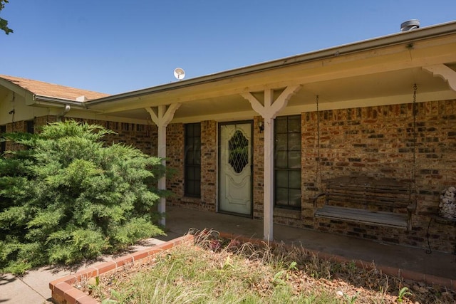 105 Pinehurst St, Borger, TX 79007 - view of exterior entry with brick siding