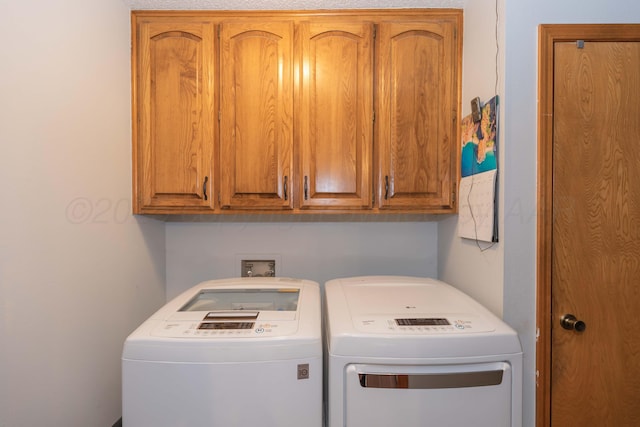 7919 Mitcham Dr, Amarillo, TX 79121 - laundry area featuring independent washer and dryer and cabinet space